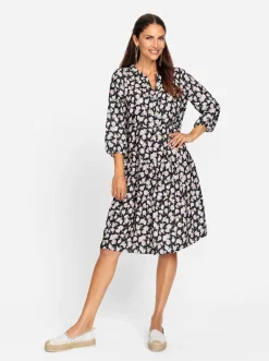 Kleider| Blumenkleid schwarz-weiß-gemustert