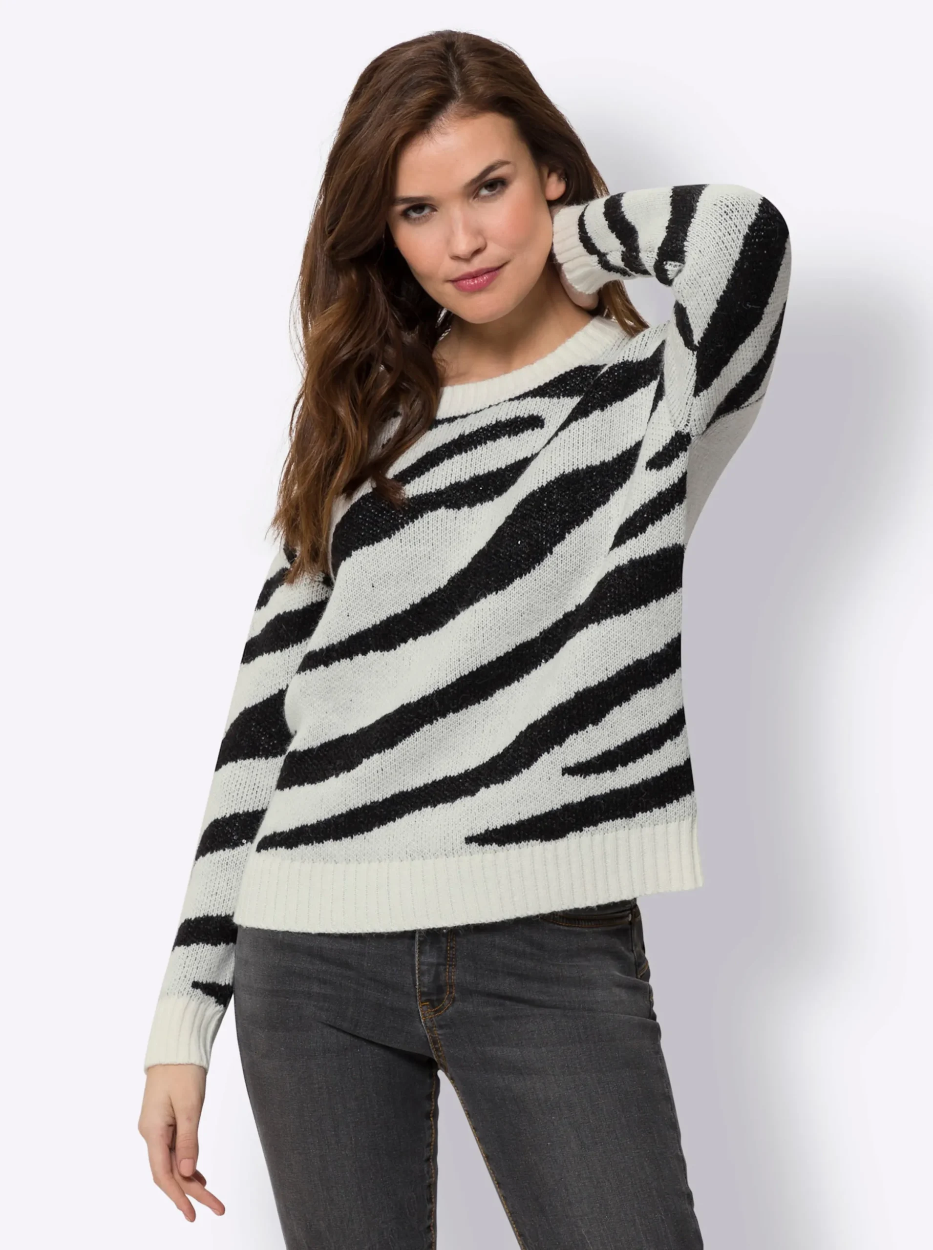 Pullover|heine Jacquardpullover im Zebramuster, verziert mit Pailletten ecru-schwarz-gemustert